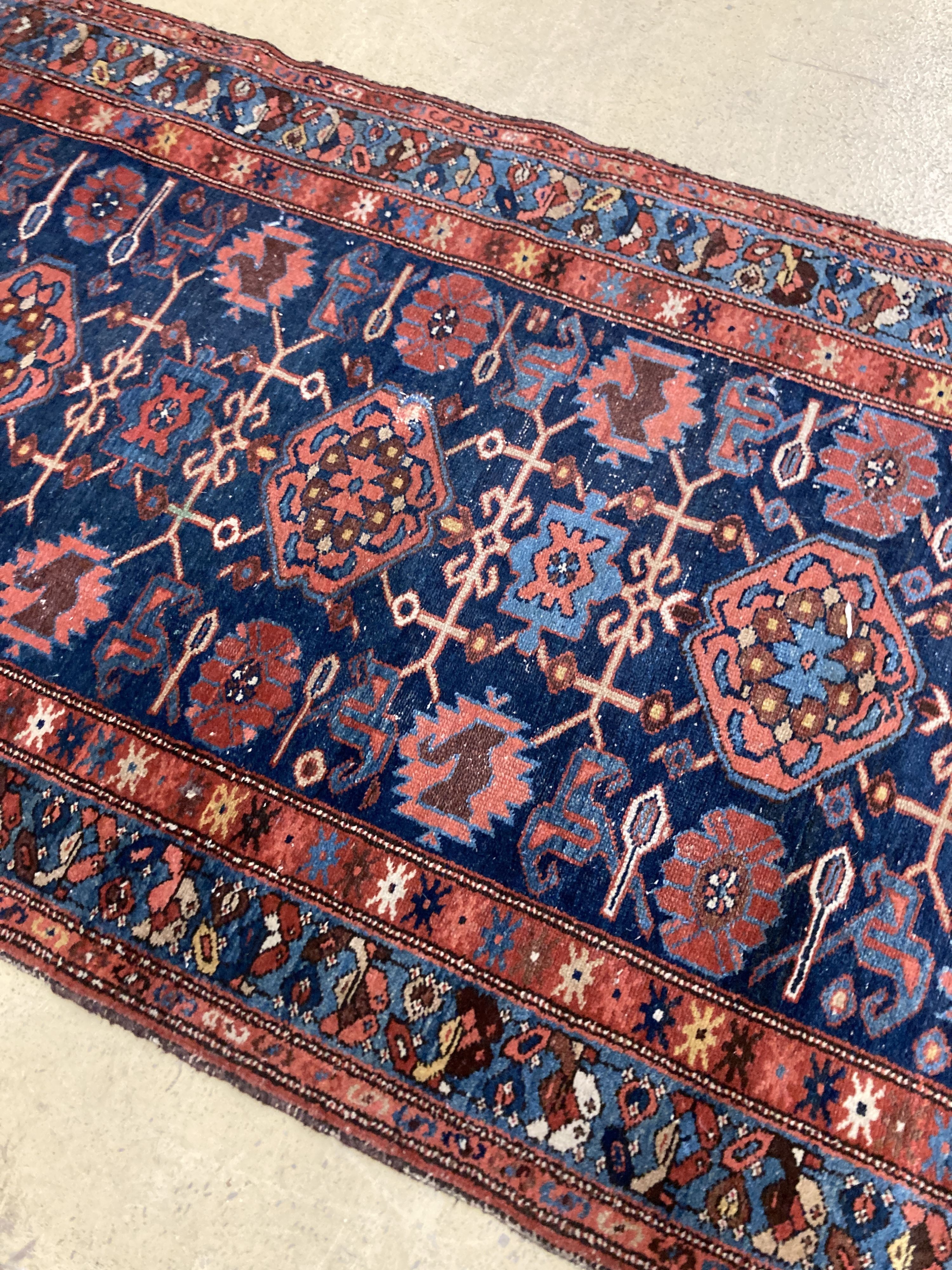 An antique Hamadan blue ground rug, 180 x 104cm